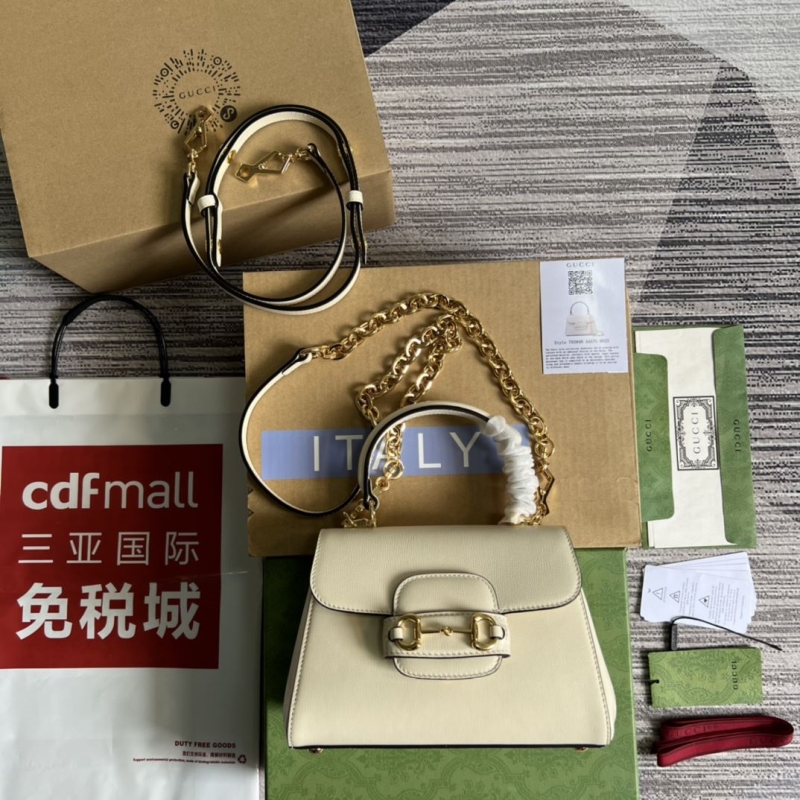 G*u*i top handle bags